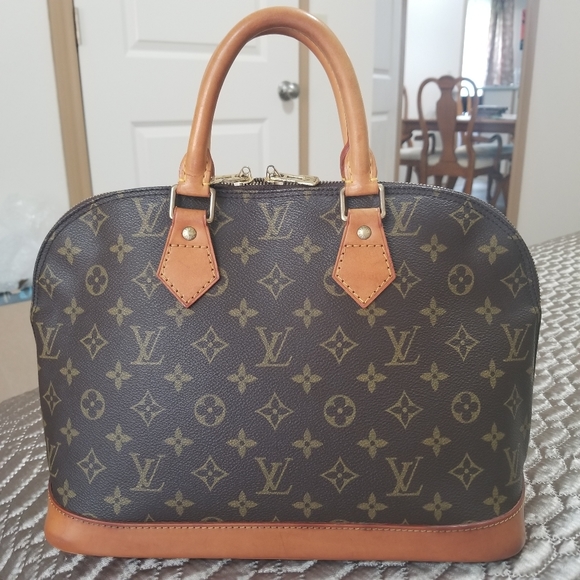 Louis Vuitton Handbags - Alma pm vintage(27 yrs.old)